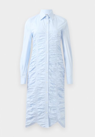 Heleweekend helesinine kleid, mis on valmistatud siledast kangast, vertikaalse rükki, nööpide ees, pikad varrukad ja kaardus äär.