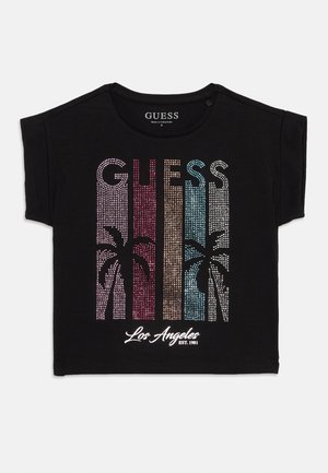Čierne krátke tričko s viacfarebnými kamienkami v tvare písmen "GUESS" a siluetami palmových stromov, pod nimi text "Los Angeles EST. 1981".