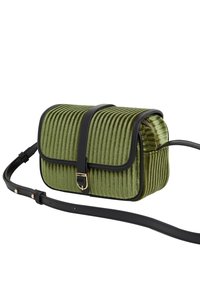 Green ribbed fabric crossbody bag with black leather accents and strap. Features a front flap and gold-tone buckle detail.