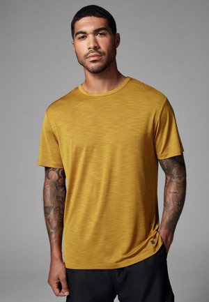 Next ACTIVE - REGULAR FIT - Basic T-shirt - ochre yellow