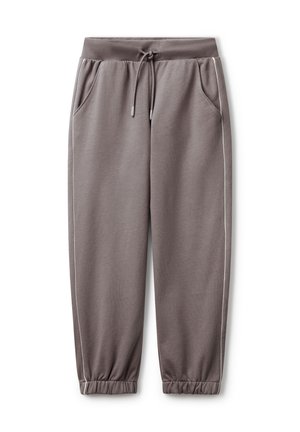 Pantalons de jogging gris en tissu doux, dotés d'une taille élastique, d'un cordon de serrage, de poches latérales et de passepoils blancs le long des coutures.