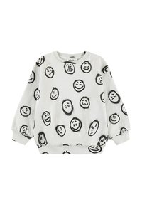 Vit sweatshirt med mönster av svarta leende och ledsna ansikten. Den har långa ärmar, rund halsringning och ribbade muddarna och nederkant.