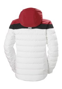 Chaqueta blanca acolchada con un diseño en bloques de color rojo y negro. Cuenta con una capucha, textura acolchada y un logo visible en la parte posterior.