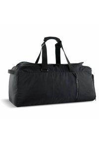 Black duffel bag with a textured nylon exterior, dual handles, and a zip closure. Features a branded accent along the zipper.