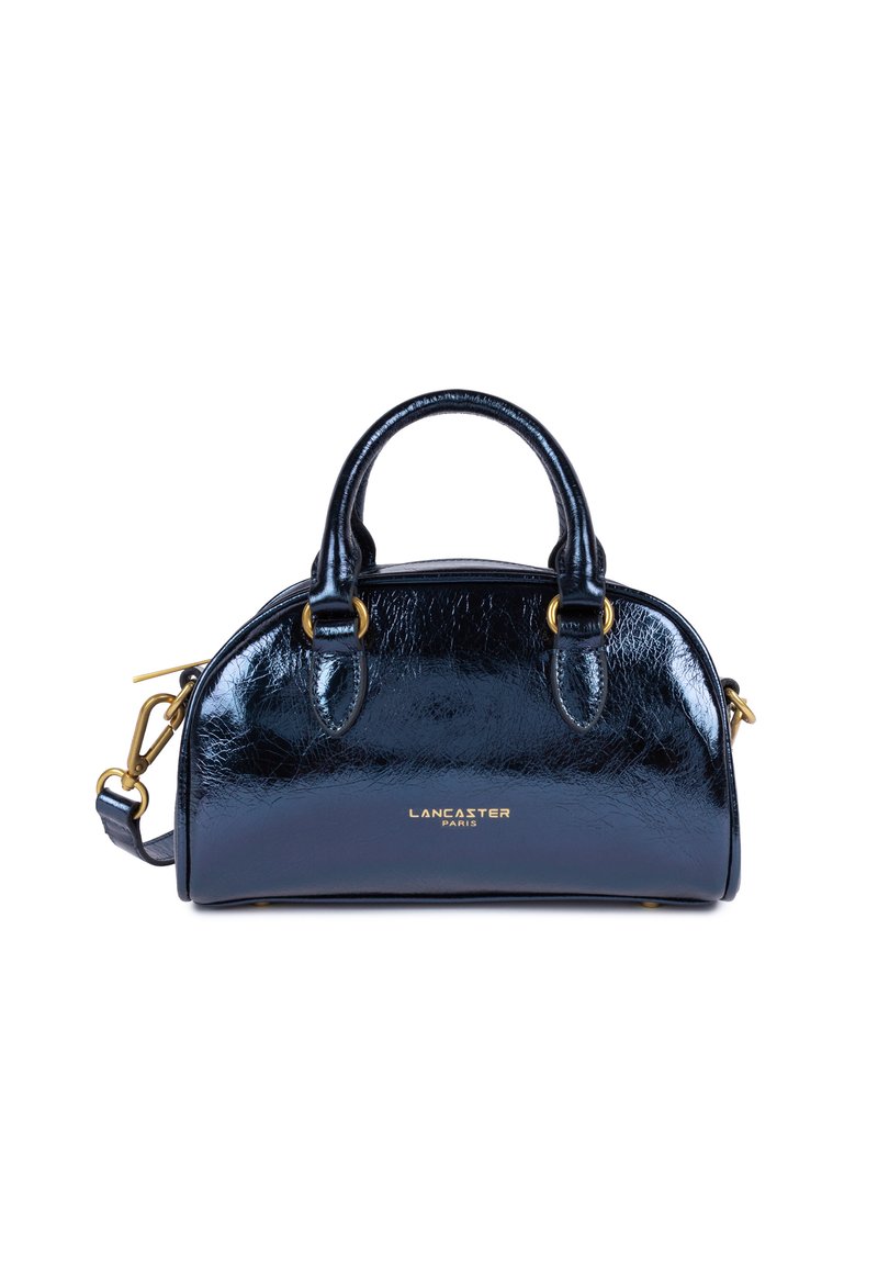Borsa a mano in vernice blu navy con forma strutturata, doppi manici superiori, tracolla removibile e dettaglio logo dorato sul fronte.