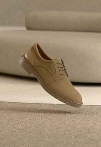 Niet geselecteerd, beige