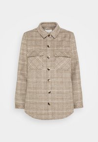 Beige ruudullinen paita takki, joka on valmistettu teksturoidusta kankaasta. Takissa on kaulus, kaksi rintataskua ja edessä napitus, jossa on kontrastiväriset napit.