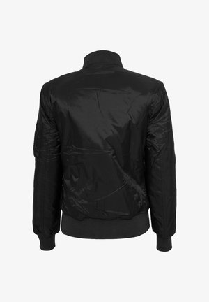 Schwarze Bomberjacke mit geripptem Kragen, Bündchen und Bund, von hinten gezeigt mit glattem, leicht glänzendem Stoff und abgesteppten Details.