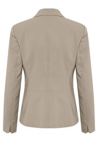 Beige blejzr se strukturovaným designem, s jedním štěrbinným zadním ventilem a klopami. Vyrobeno z hladké látky, s přešitými švy a dlouhými rukávy.