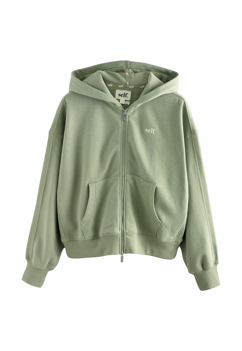 Hellgrüne Kapuzenjacke mit Reißverschluss, großen frontalen Taschen und gerippten Bündchen. Hergestellt aus weichem Stoff mit einem dezenten Logo auf der linken Brust.