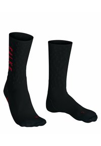 Calze sportive nere con un design testurizzato, tessuto a coste, logo rosso "FALKE" e zone rinforzate in punta e tallone per garantire durata.