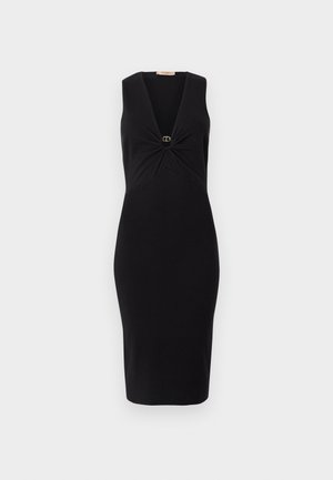 Black sleeveless dress with a deep V-neck and twisted front detail featuring a circular gold accent at the center. Bodycon fit to knee length.