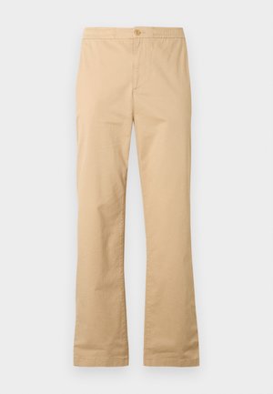 Pantalon en coton beige avec un design à jambe droite, doté d'une fermeture à bouton à l'avant et sans motifs ni accents visibles.