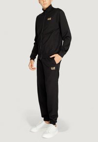 TRAIN CORE ID TRACK SUIT - Chándal - black gold