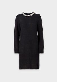 Robe en maille noire à manches longues et col rond. Le col est orné d'une décoration de cristaux.