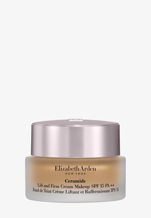Elizabeth Arden Ceramide Lift and Firm Cream -meikkivoidepurkki, jossa on SPF 15, huurretussa lasissa ja metallikannessa valkoisella taustalla.