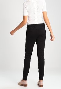 Culture Tygbyxor - black