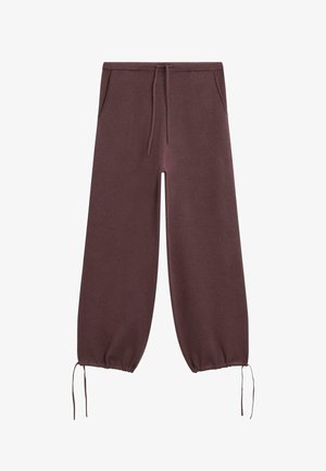 Pantalons de jogging bordeaux avec une taille à cordon, des poignets élastiques et des poches latérales. Fabriqués en tissu doux et texturé pour le confort.