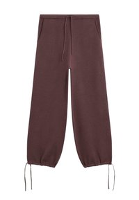 Pantalons de jogging bordeaux avec une taille à cordon, des poignets élastiques et des poches latérales. Fabriqués en tissu doux et texturé pour le confort.