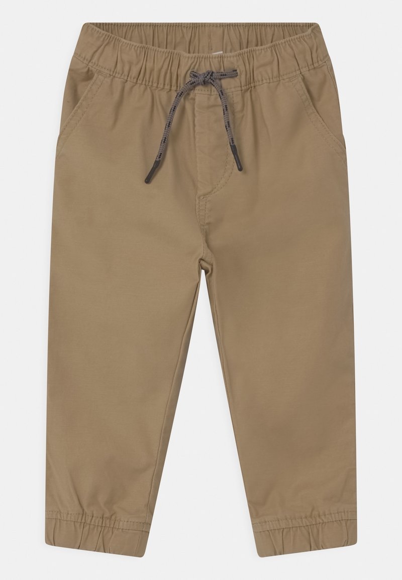 Pantalon brun clair pour tout-petit avec taille élastique, cordon gris, poches latérales et poignets élastiques.