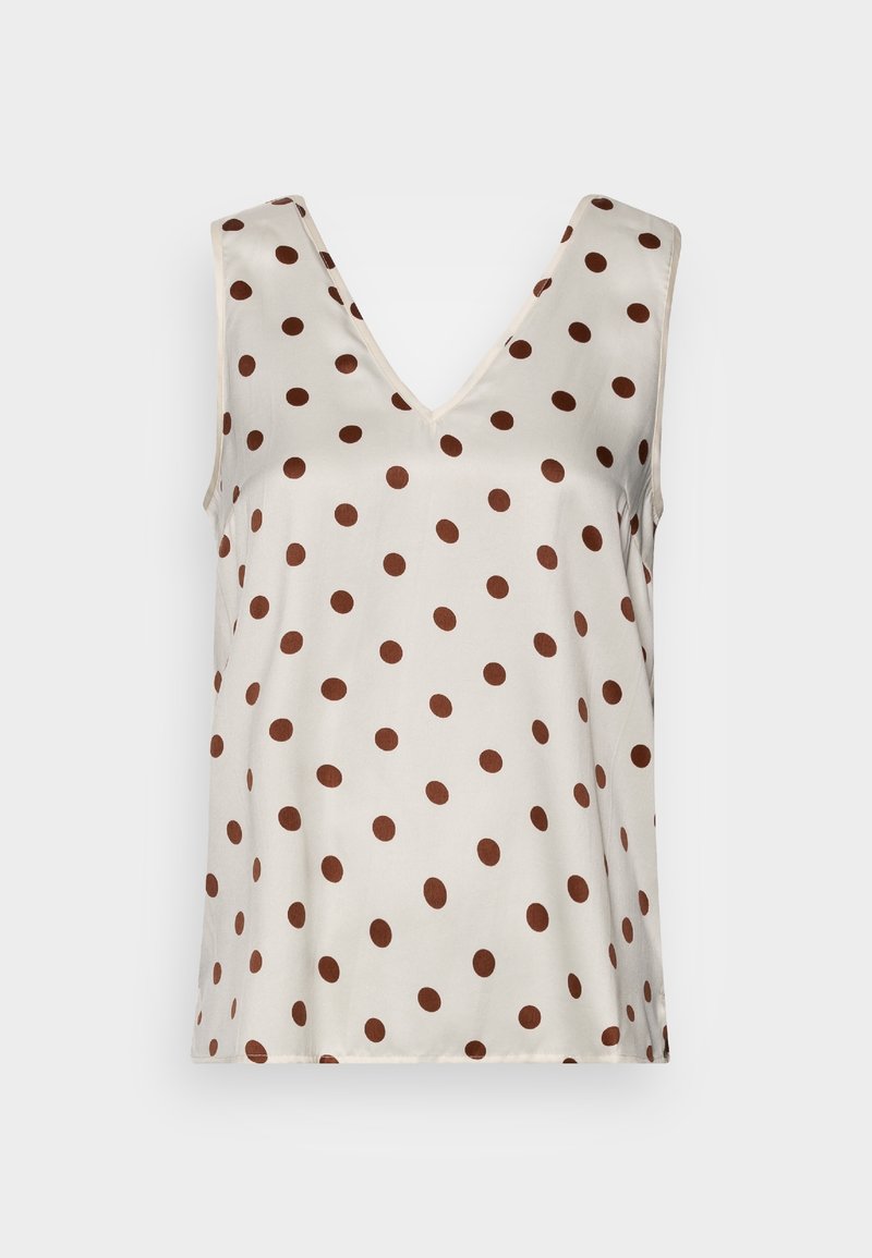 Haut beige sans manches à pois marron avec un col en V, présenté sur un fond uni.