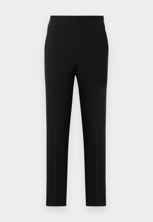Sorte bukser med et strømlinet design, lavet af glat stof. Har en elastisk talje og tapered ben med minimal syning.