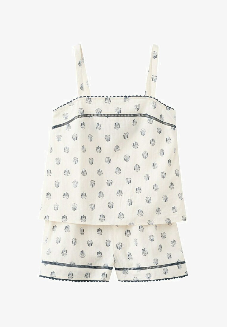 Cremfarbenes ärmelloses Schlafanzug-Set mit marineblauem Blumenmuster, gewelltem Saum und passenden Shorts mit dekorativen horizontalen Streifen.