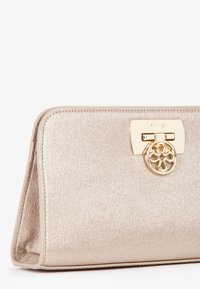 V73 Pochette - color oro