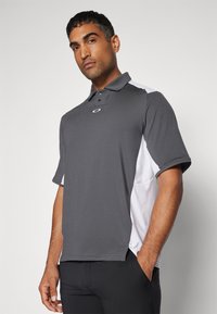 Oakley REDUCT ECHO - Poloshirts - uniform grey