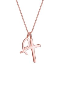 Collar de oro rosa con colgantes en forma de cruz y pez, textura suave, enlazados por una cadena, resaltando un diseño minimalista.