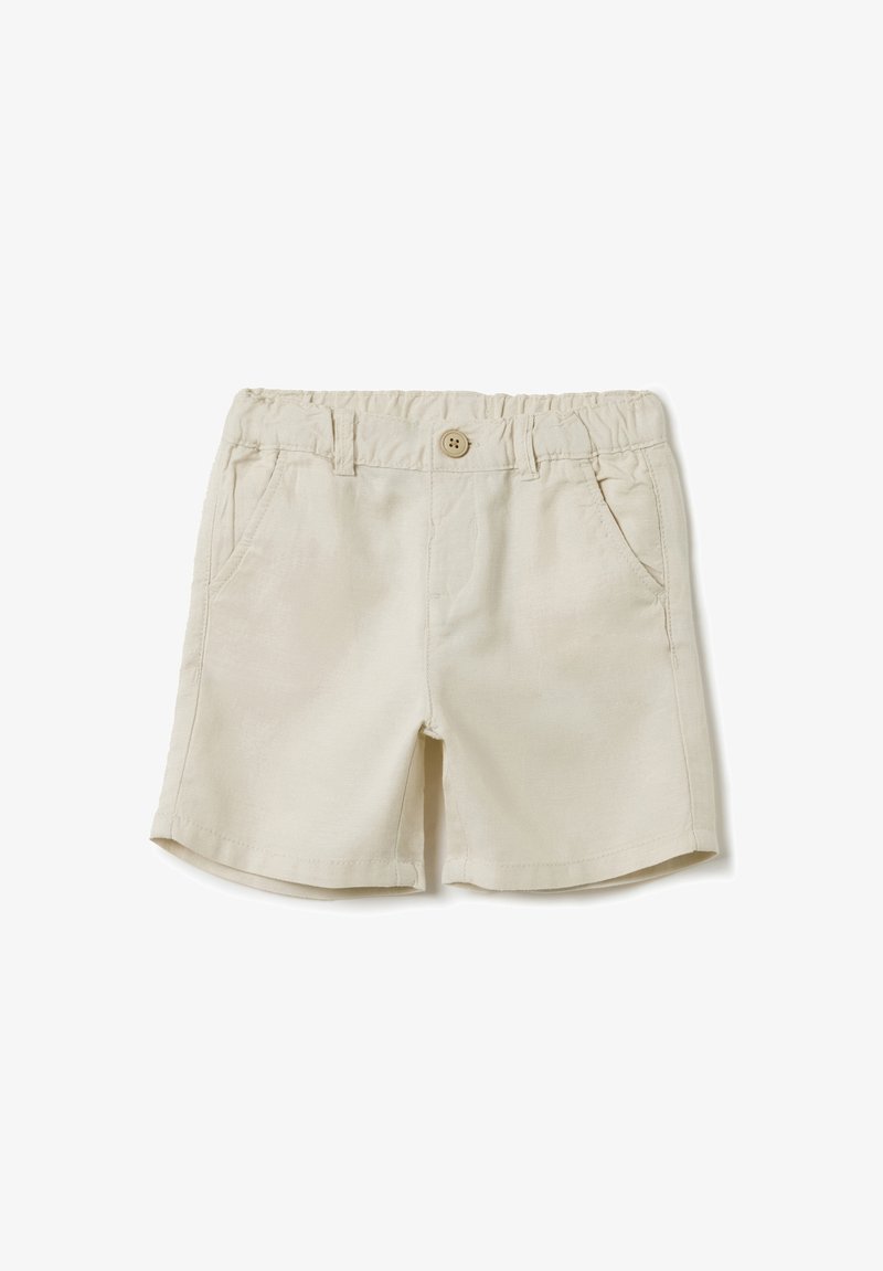 Shorts beiges en tissu doux, dotés d'une taille élastique, d'une fermeture à bouton et de deux poches latérales. Texture lisse et coupe droite.