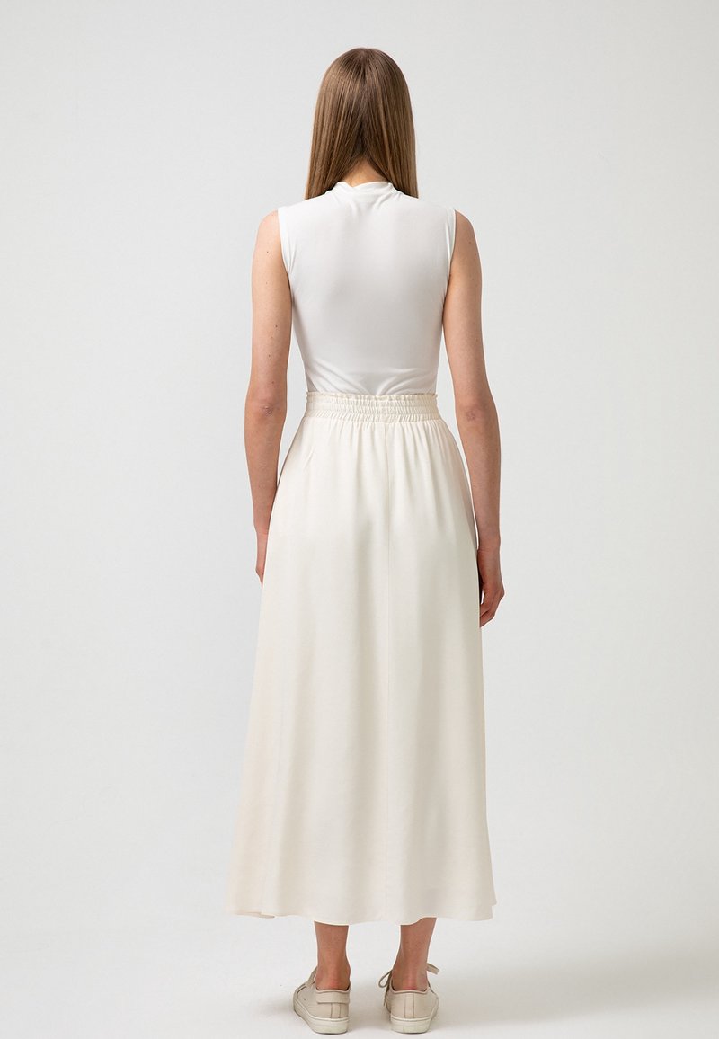 Touché Privé Jupe longue off-white/écru (Seconde main