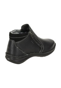 Botte de cheville en cuir noir avec une finition lisse, fermeture éclair sur le côté, couture grise et semelle texturée. Doublée d'un matériau doux pour la chaleur.