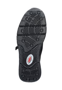 Black rubber sole with textured grip patterns and raised circular accents. Features a logo detail in red and silver on the side.