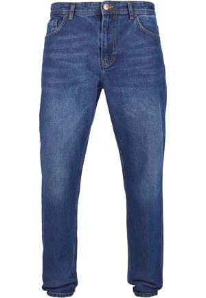 Jeans denimowe w ciemnoniebieskim odcieniu z prostym krojem nogawki. Posiadają pięć kieszeni, szlufki na pasek oraz zapięcie na guzik z przodu.