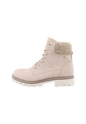 Bottine beige à lacets avec col en tricot rembourré, bout rond, semelle épaisse et détails cousus.