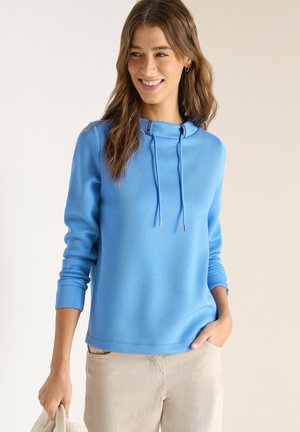 - Bluzka z długim rękawem