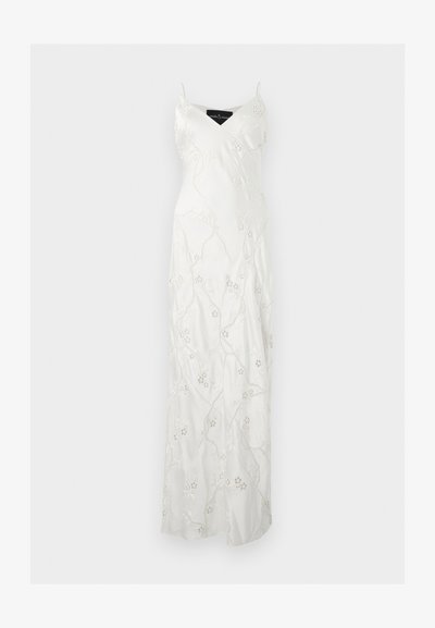 Λευκό αμάνικο φόρεμα μέχρι το πάτωμα με λεπτές τιράντες και λεπτή ανθιστή κεντητική σε όλο το ύφασμα.