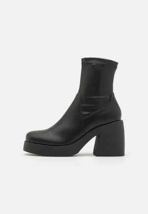 Ankelboots med høye hæler - black paris