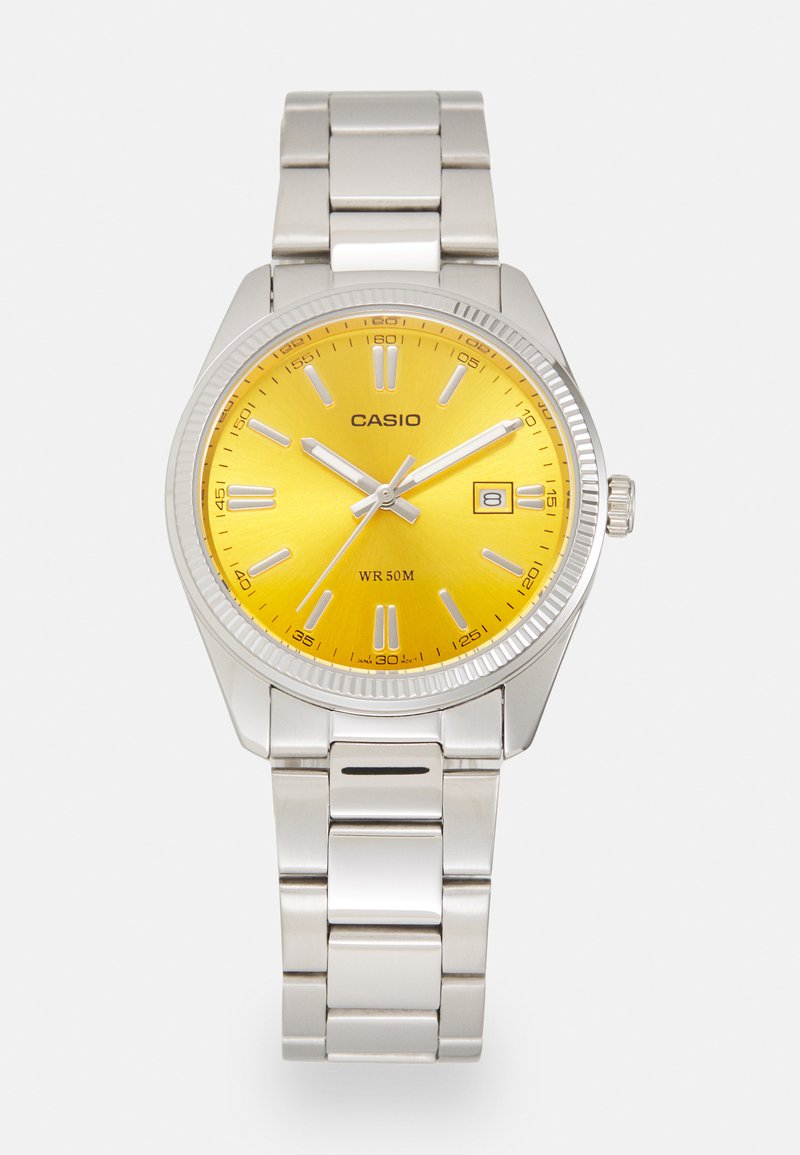 Silver stainless steel watch with a round yellow dial, silver hour markers, date display, and a metal link bracelet. Water-resistant up to 50 meters.