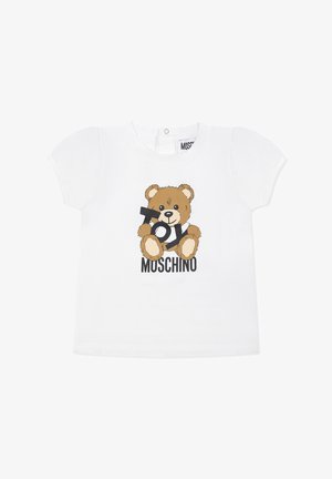 T-shirt bianco a maniche corte con grafica di un orsetto e la scritta "Toy Moschino" in nero sotto. Materiale in cotone morbido.