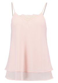 Camisole sans manches rose clair avec de fines bretelles, décolleté en V, dentelle au niveau de la poitrine et ourlet en chiffon superposé.