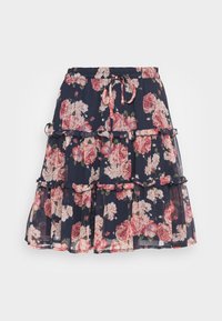 Tummansininen kerrostettu hame, jossa on vaaleanpunaisia ja valkoisia kukkakuosia, röyhelöyksityiskohtia ja nyörillä varustettu vyötärönauha.