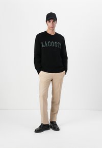 Lacoste Džemperis - black/green