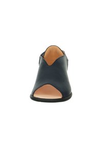 Navy blue leather sandal featuring a peep toe, v-shaped cutout design, and a black sole. The interior is light tan.