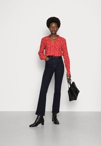 Marks & Spencer Vaqueros a campana - indigo mix