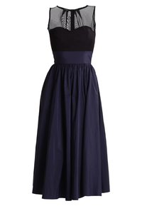 Navyblaues Kleid mit einem taillierten schwarzen Oberteil und durchsichtiger Netzüberlagerung. Ausgestellter Rock mit gerafftem Taillendetail. Elegantes und strukturiertes Design.