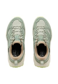 Light green athletic shoes with mesh and suede upper, reflective accents, lace-up design, and textured sole with yellow-green highlights.