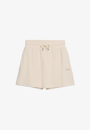 Skort deportivo color crema con cinturilla elástica y cordón, con el logo de Puma en el lado izquierdo.