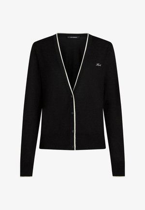 Cardigan nero con bottoni e bordo bianco lungo lo scollo e i polsini, con piccolo ricamo "Karl" sul petto sinistro.